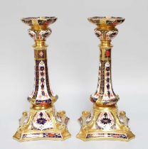 A Pair of Royal Crown Derby Porcelain Table Candlesticks, 1984 and 6, with knopped sconces raised