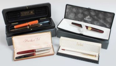 A Collection of Parker Pens, including an orange cased duofold with 18k stamped nib, another
