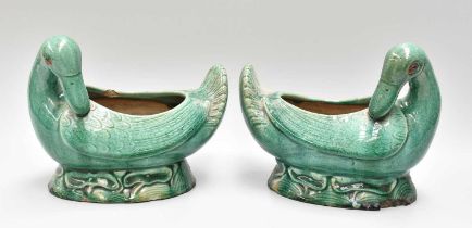 A Pair of Chinese Earthenware Bowls, Qing Dynasty, each modelled as a duck preening its feathers,