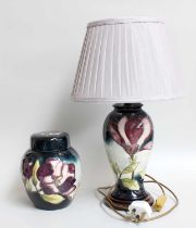 A Modern Moorcroft Pottery Ginger Jar, ''Magnolia'' pattern, 19cm high; together with a table lamp