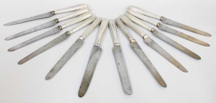 A Set of Twelve Victorian and Dutch Silver Table-Knives, Eight by Differing Makers, London, 1881 and