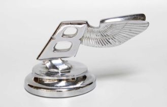 A Bentley Presentation Paperweight, presented to Hoffmans, Halifax 7cm high by 14cm long