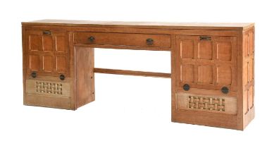 Sidney (Sid) Pollard (1914-1994) of Thirsk: A Panelled Oak Music Cabinet, the adzed top above a