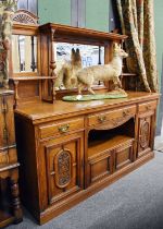 A Late Victorian Carved Oak Mirror Back Sideboard, 197cm by 61cm by 186cm