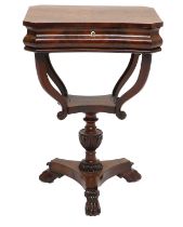 A Mid 19th Century North European Mahogany Work Table, of concave shaped form, the quarter-