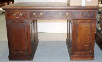 A Victorian Oak Pedestal Desk, 138cm by 81cm by 84cm