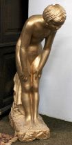 A Composition Gold Painted Statue of Young Child, on lock work plinth, 86cm high