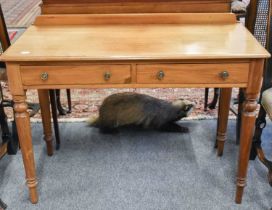 A 19th Century Walnut Side Table, fitted with two drawers, 107cm by 50cm by 79cm