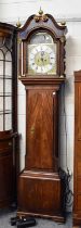 A Mahogany Eight Day Longcase Clock, 13" arch brass dial, bearing a later signature Scotson,