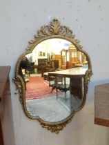 A Gilt Metal Floral Wall Mirror, together with another similar (2)