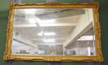 A 19th Century Style Gilt Framed Mirror, the rectangular bevel plate within a conforming frame
