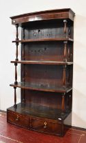 A 19th Century Mahogany Four-Tier Bowfronted Hanging Shelf, fitted with two base drawers, 61cm by