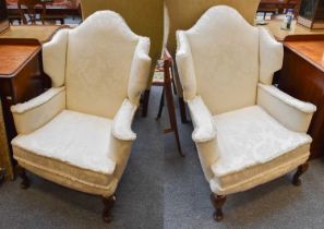 A Pair of 20th Century Wing Back Armchairs, in the George III style