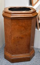 An Octagonal Walnut Pedestal, with moulded top and base, 42cm by 35cm by 70cm