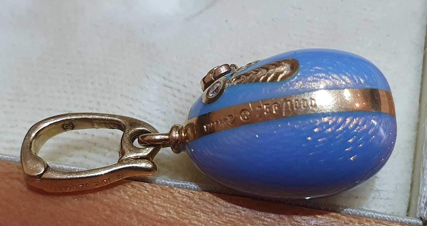 An Enamel Egg Pendant, by Victor Mayer for Fabergé enamelled front and back in blue, with a yellow - Image 6 of 7