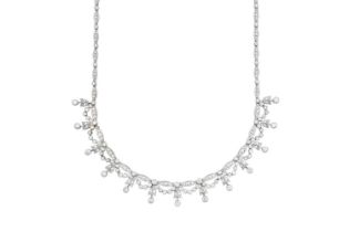 A Diamond Necklace graduated lozenge shaped links set throughout with trios of round brilliant cut