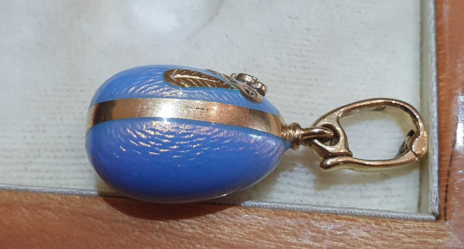 An Enamel Egg Pendant, by Victor Mayer for Fabergé enamelled front and back in blue, with a yellow - Image 7 of 7