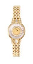 Chopard: A Lady's 18 Carat Gold Diamond Set Wristwatch, signed Chopard, model: Happy Diamonds,