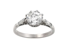A Diamond Solitaire Ring the old cut diamond in a white claw setting, to old cut diamond set