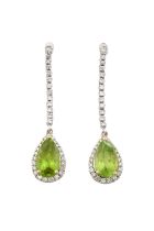 A Pair of 18 Carat White Gold Peridot and Diamond Drop Earrings a row of round brilliant cut