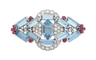 An Art Deco Style Aquamarine, Ruby and Diamond Brooch modelled as a lozenge motif, set throughout