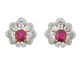 A Pair of Ruby and Diamond Cluster Earrings the cushion cut rubies in yellow claw settings, within