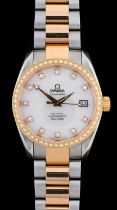 Omega: A Steel and Gold Diamond Set Automatic Calendar Centre Seconds Wristwatch, signed Omega, Co-