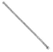 A Diamond Line Bracelet thirty-one clusters formed of a princess cut diamond within a border of