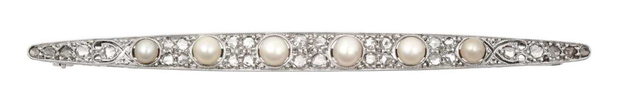 An Edwardian Pearl and Diamond Brooch the tapering bar set throughout with six graduated pearls