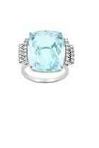 An 18 Carat White Gold Aquamarine and Diamond Ring the rectangular cushion cut aquamarine flanked by