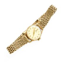 A Lady's 9 Carat Gold Wristwatch, signed Omega, with attached 9 carat gold bracelet, with Omega