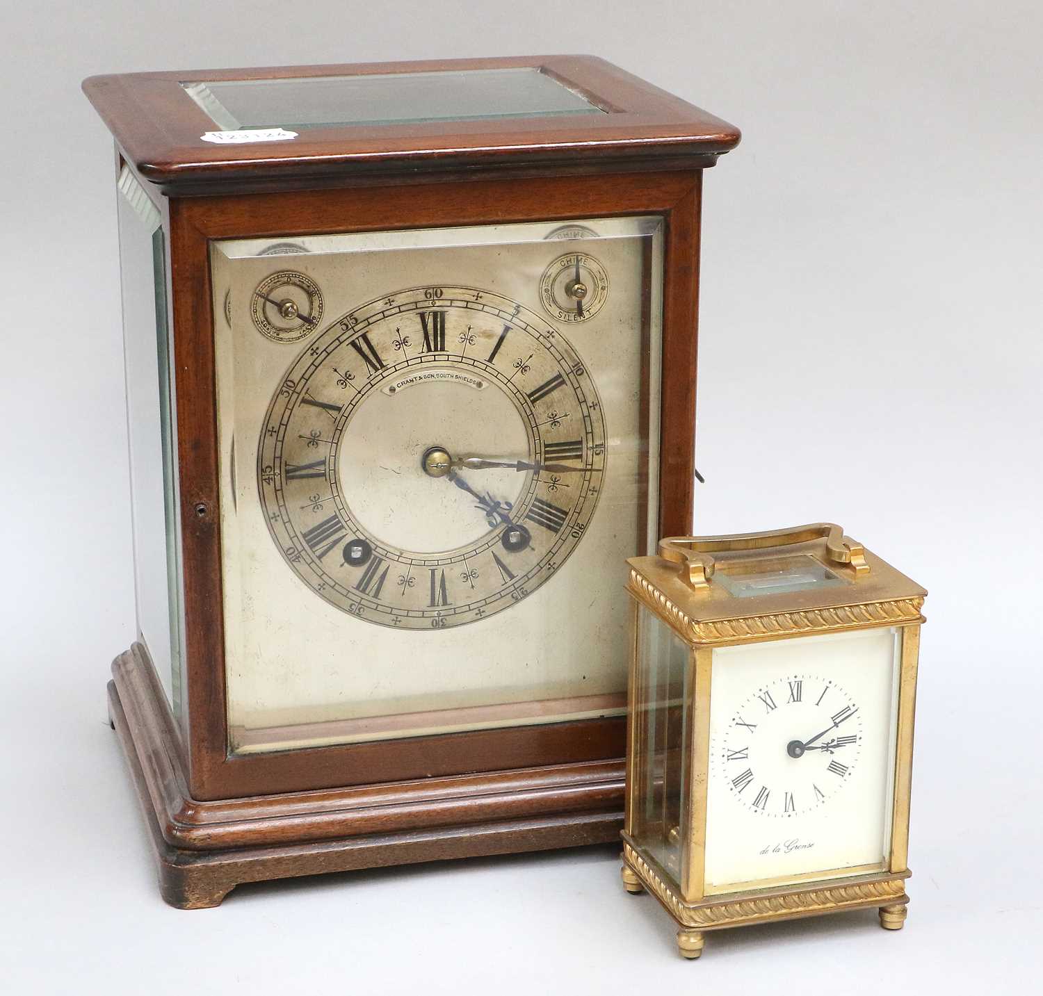 An Mahogany Cased Quarter Striking Mantel Clock, early 20th Century,the dial signed Grant & Son,