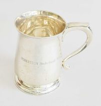 An Elizabeth II Silver Christening-Mug, by Edward Barnard and Sons Ltd., London, 1962, in the George