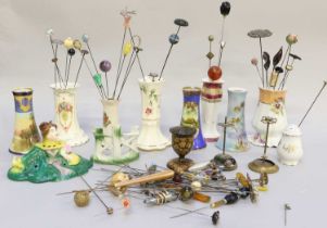 A Collection of Assorted Decorative Hat Pins, together with fourteen stands, including three