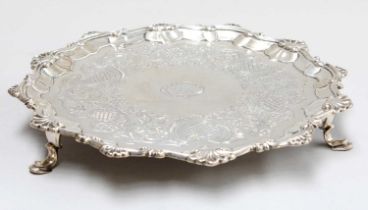 A George III Silver Waiter, Makers Mark I.C, London, 1772, shaped circular and on four pad feet,