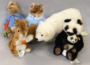 Modern Steiff Soft Toys, comprising a seated panda and cub in drawstring bag, Siro standing polar