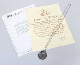 A 'Piece of Eight' Coin Pendant, featuring a 1738 silver eight reales coin, set in a pendant mount