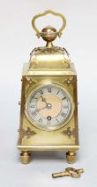 An Arts and Crafts Brass Carriage Timepiece, single barrel movement with a later platform lever