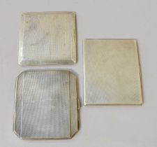 Three Silver Cigarette-Cases, each square or oblong and with engine-turned decoration, one