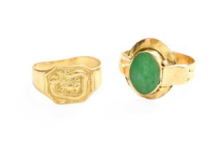 A Chinese Ring, depicting a dragon motif, finger size P1/2; and A Green Hardstone Ring, finger