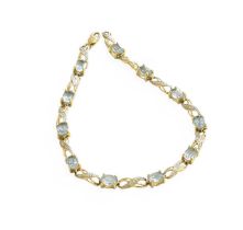 A 9 Carat Gold Aquamarine and Diamond Bracelet, the oval cut aquamarines in yellow four claw