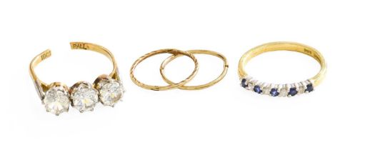 An 18 Carat Gold Sapphire and Diamond Half Hoop Ring, the alternating round cut sapphires and