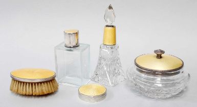 A Collection of Assorted Silver and Yellow Enamel Dressing-Table Items, comprising a circular box,