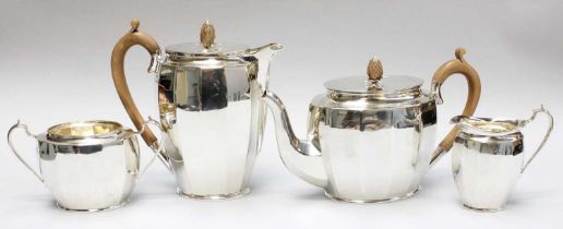 A Four-Piece Silver Tea-Service, by Stower and Wragg Ltd., Sheffield, 1932, each piece faceted