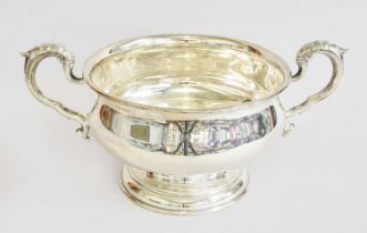 A George V Silver Two-Handled Bowl, by Mappin and Webb, London, 1910, the bowl circular and on
