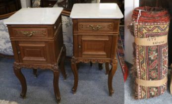 A Pair of French Oak Bedside Cabinets, with white marble tops, 42.5 square by 85cm by
