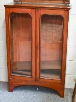 A Mahogany Glazed Bookcase, with adjustable shelves, 85cm by 30cm by 125cm