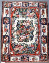 Bakhtiari Rug, the ivory field with central panel of stylised flowers enclosed by similar