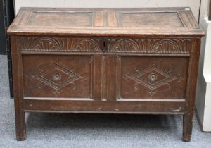 An 18th Century Carved Oak Two Panel Coffer, 110cm by 51cm by 70cm The top engraved with initials EP