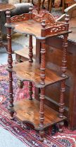 A Victorian Walnut Three Tier Whatnot, 106cm high and A George III Style Mahogany Standing Corner